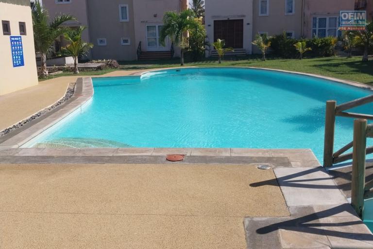 For sale a 2 bedroom duplex in a secure residence with shared swimming pool and tree-filled courtyard in Grand Gaube.