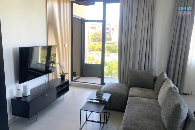 Flic en Flac for rent, magnificent and recent 2 bedroom apartment with roof terrace, breathtaking views, swimming pool and covered parking.