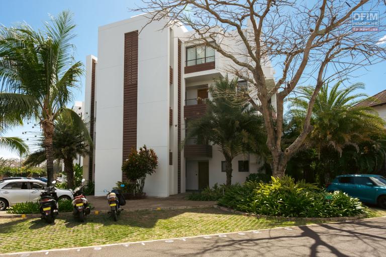 Mon Choisy for sale IRS apartment accessible to foreigners on the ground floor with 2 bedrooms in a secure residence 2 steps from the beach.