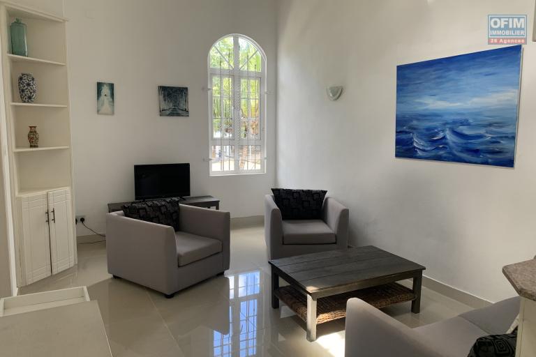 La Gaulette for sale villa divided into 4 two-bedroom apartments with commun swimming pool in a quiet residential area.