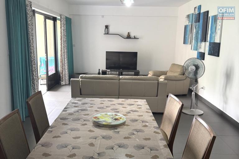 Flic en Flac for rent 2 bedroom apartment located in a secure residence with swimming pool, elevator and covered parking.