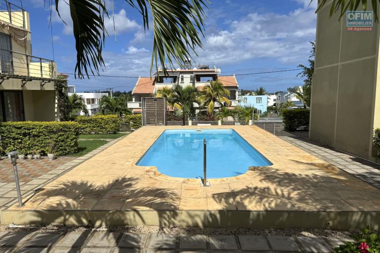 Flic en Flac for rent a stylish 3 bedroom triplex with communal pool and secure parking