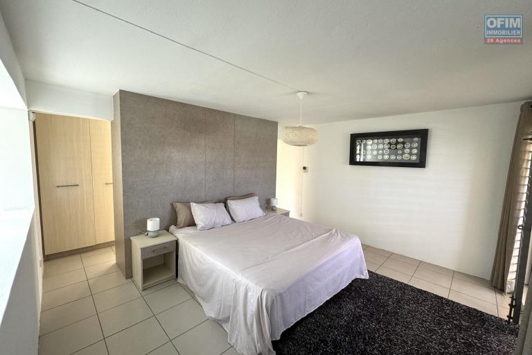 Flic en Flac for rent a stylish 3 bedroom triplex with communal pool and secure parking