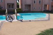 For sale a 2 bedroom duplex in a secure residence with shared swimming pool and tree-filled courtyard in Grand Gaube.