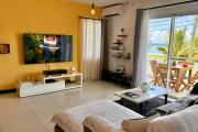 For sale beautiful four bedroom apartment on the first floor in Pointe Aux Piments with a sea view.