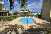 Flic en Flac for rent a stylish 3 bedroom triplex with communal pool and secure parking