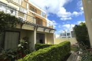 Flic en Flac for rent a stylish 3 bedroom triplex with communal pool and secure parking