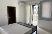 Flic en Flac for rent recent 3 bedroom apartment with shared swimming pool located in a quiet residential area.