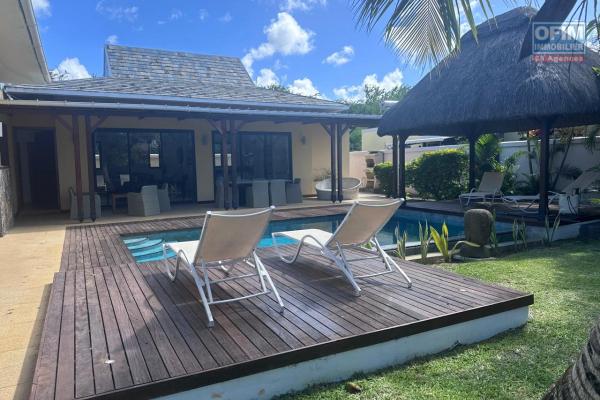 Discover this magnificent 4 bedroom villa, nestled in the heart of a private residence, just a few steps from the coastal road.