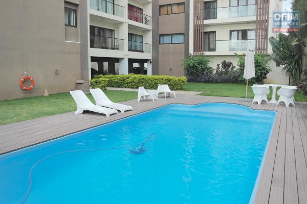 Flic en Flac for rent 2 bedroom apartment located in a secure residence with swimming pool, elevator and covered parking.