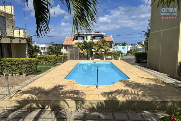 Flic en Flac for rent a stylish 3 bedroom triplex with communal pool and secure parking